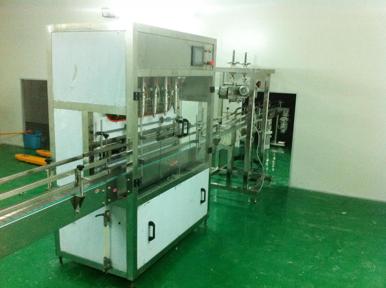 Linear filling machine with 4 filling heads ЛИНЕАРНА МАШИНА ЗА ПОЛНЕЊЕ.jpg