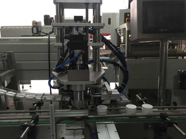 машина за запечатување тегли.jpg