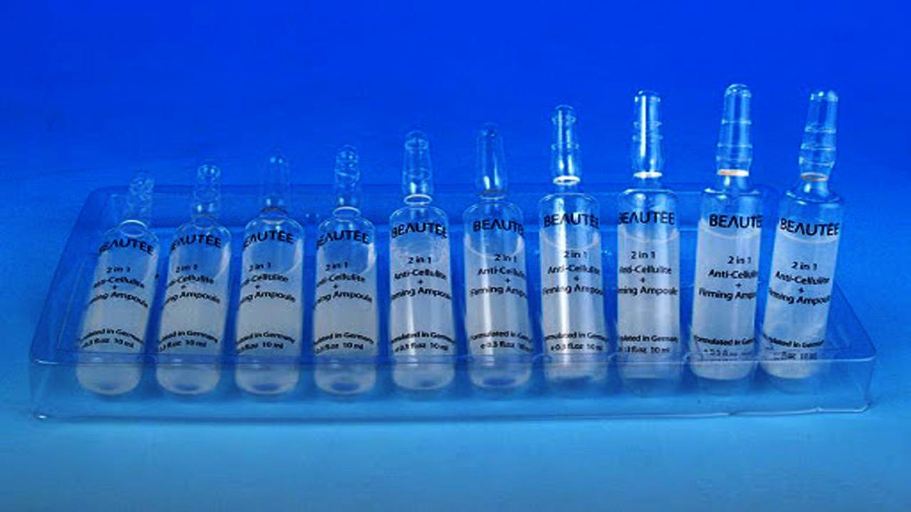 liquid solution bottles labeling machine samples final products шишиња со ампули.jpg