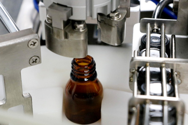 машина за полнење шишиња со масло маса.jpg