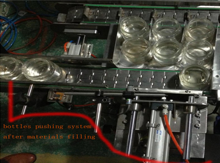 automatic bottles pushing system after filing систем за туркање шишиња.jpg